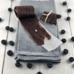 Mixed Berry Fruit Leathers on a parchment lined sheet.