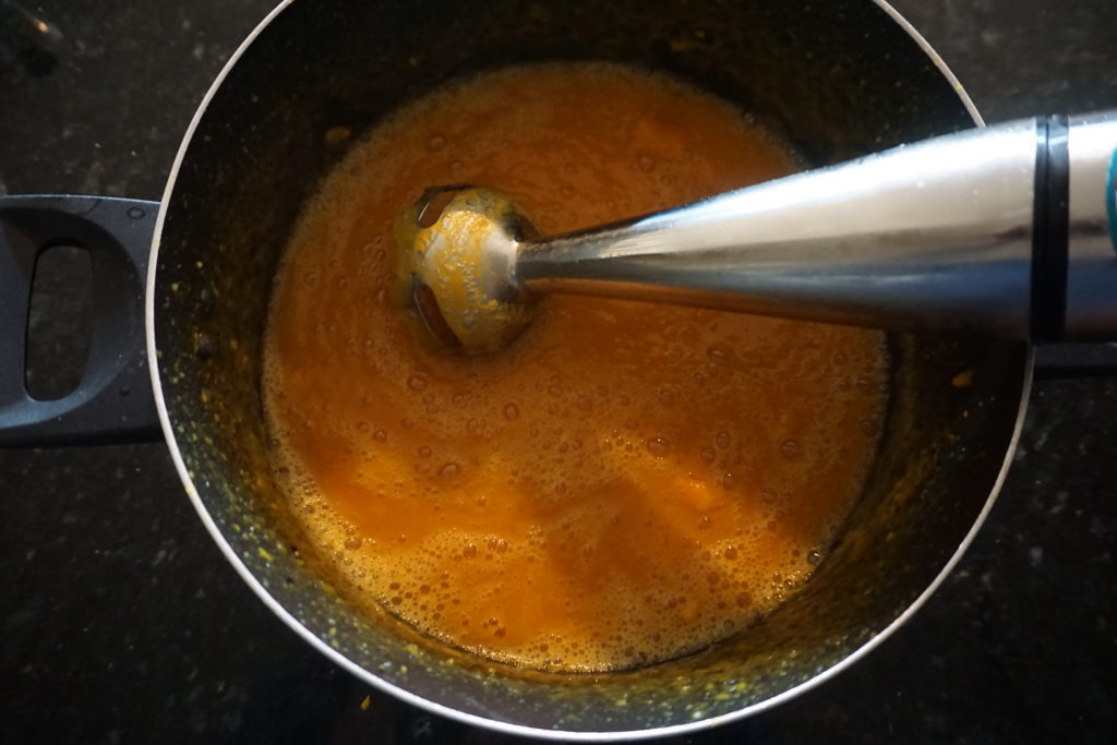 Immersion blender used to puree soup.