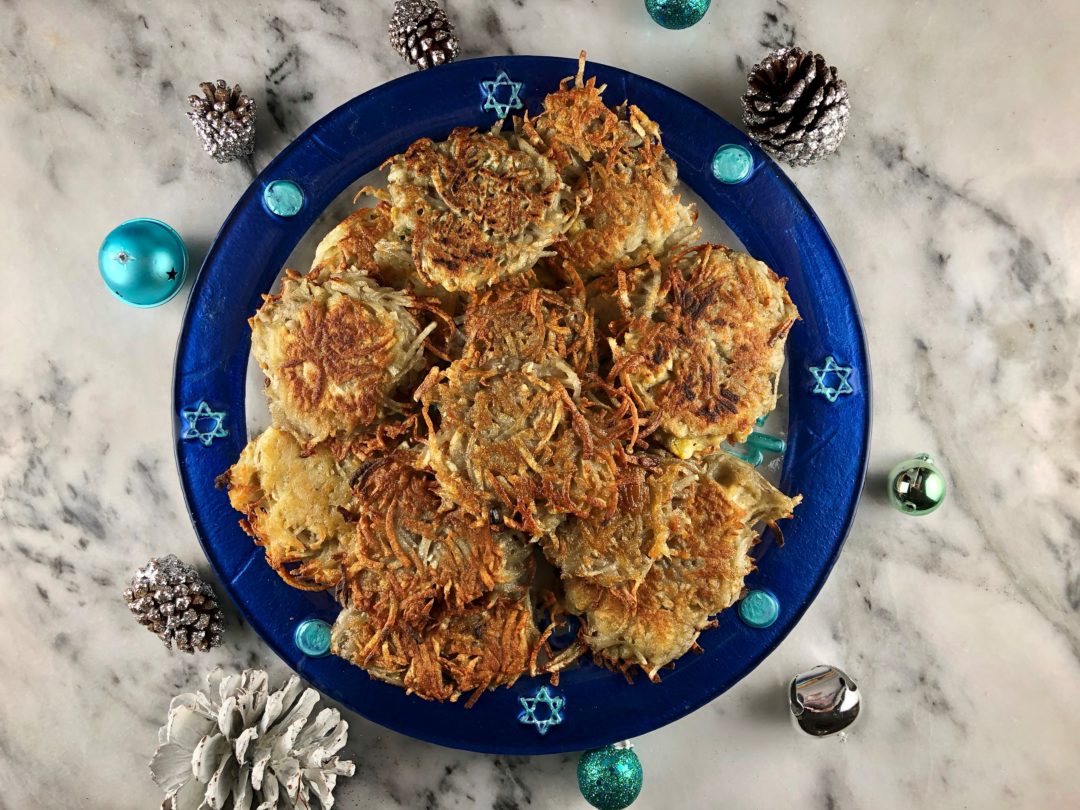 FODMAP friendly Latkes on a blue plate