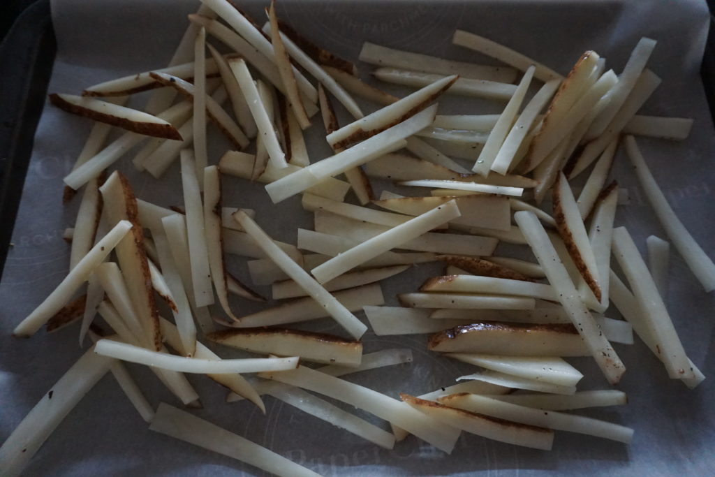 Drained and Dried Potatoes Ready to be Baked.