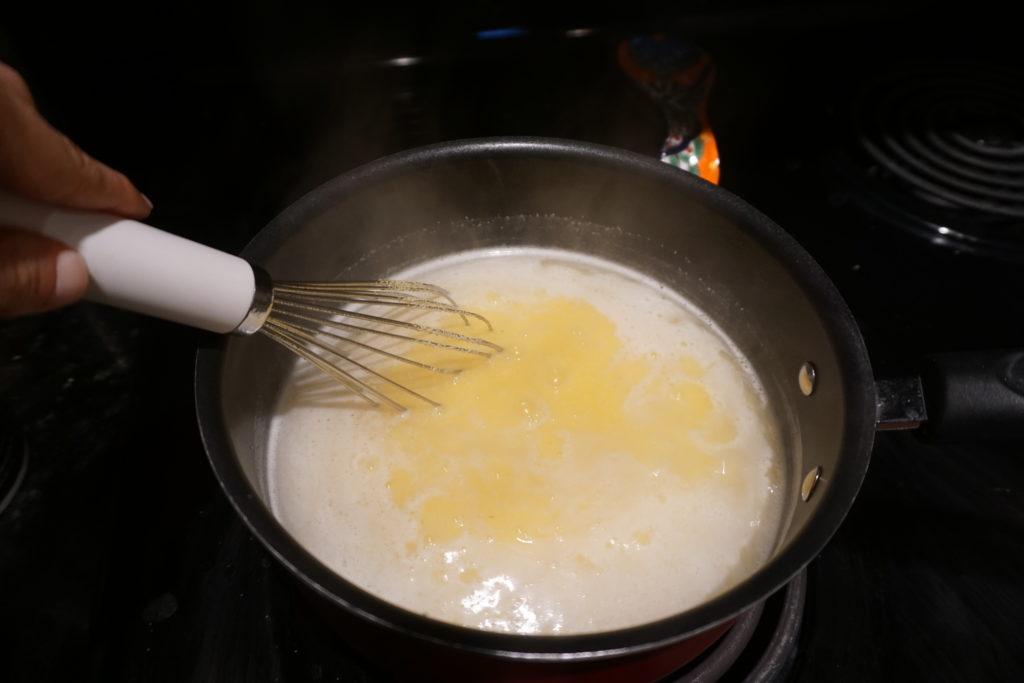 Polenta Being Cooked on Stovetop. 