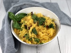 FODMAP Spaghetti squash - Summer spaghetti squash in a white bowl