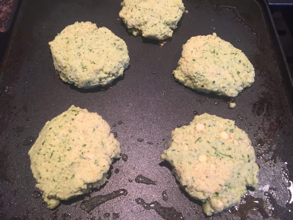 Briefly browning the falafel on each side.