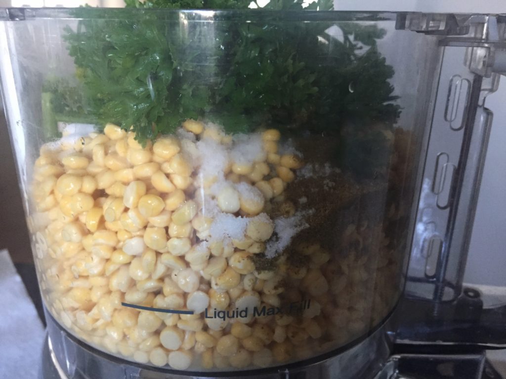 Chickpeas plus ingredients ready to be processed. 