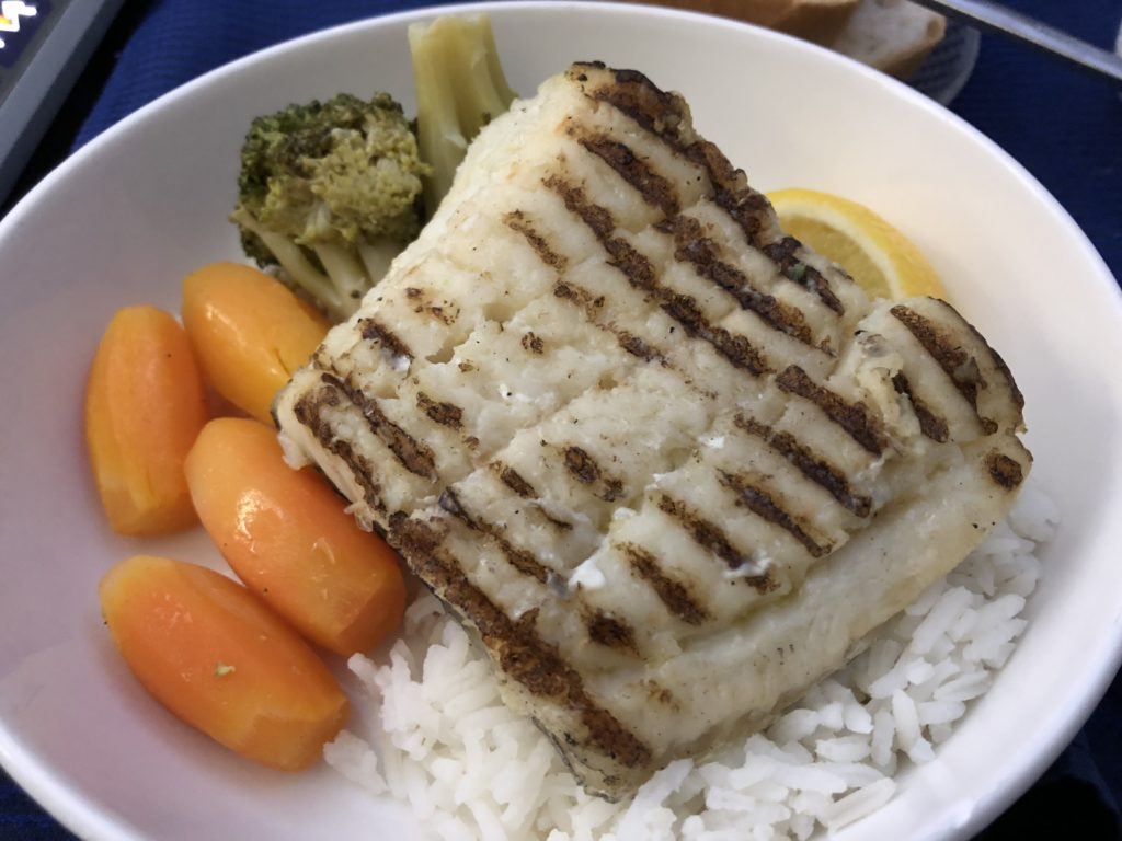 United Airlines: Lunch - fish, rice and vegetables