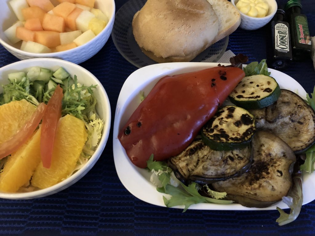 United Airlines: Dinner - grilled vegetables, salad and fruit