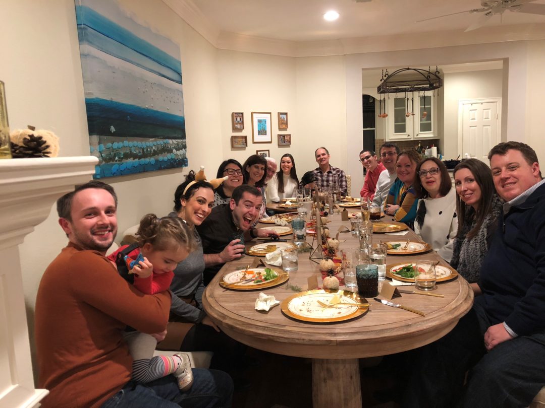 Thanksgiving dinner surrounded by family and friends