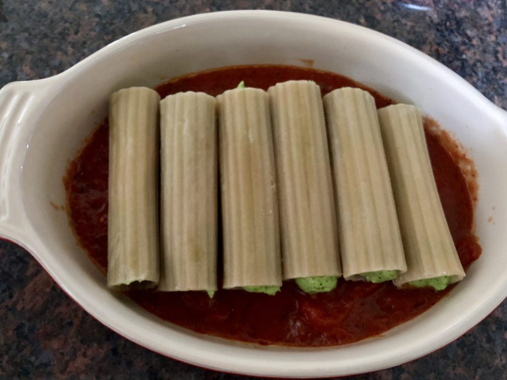 Manicotti ready to be baked in the oven.