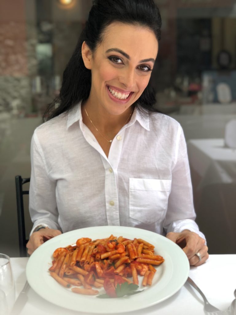 I'm enjoying a big bowl of gluten-free pasta from La Fontana in Lake Como, Italy.