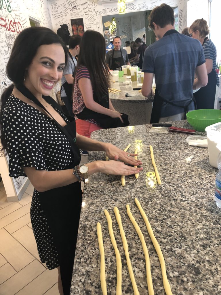 Mollie learning how to make gluten-free gnocchi in a cooking class in Sorrento.