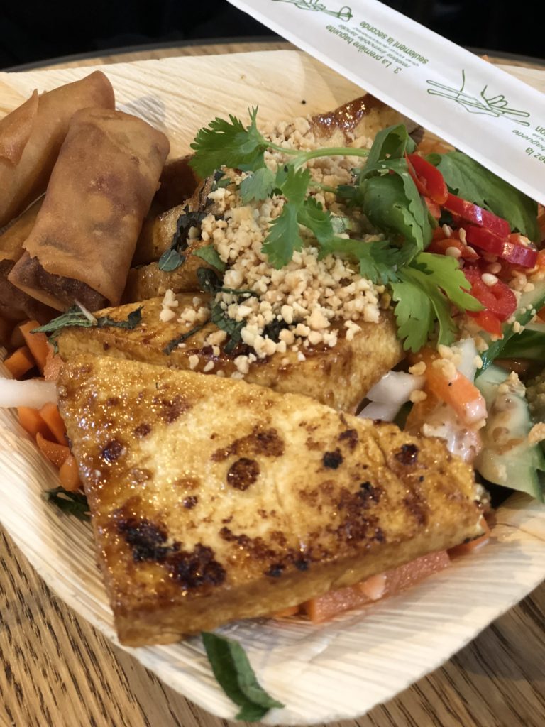 Enjoying lunch at the Foodhallen in Amsterdam - tofu vermicelli bowl.