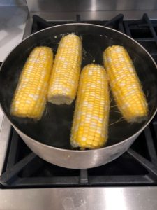 Boiling corn on the cob