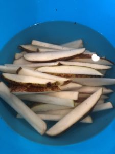 Potatoes soaking in water