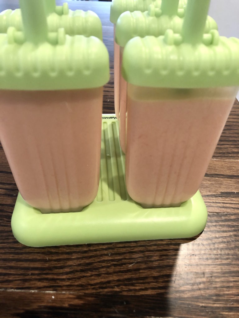 Low FODMAP fruit - Papapa coconut popsicles ready to freeze.